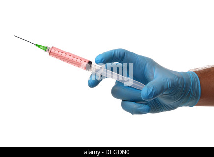 Medico con una siringa Foto Stock