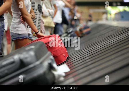 Il reclamo bagagli in aeroporto Foto Stock
