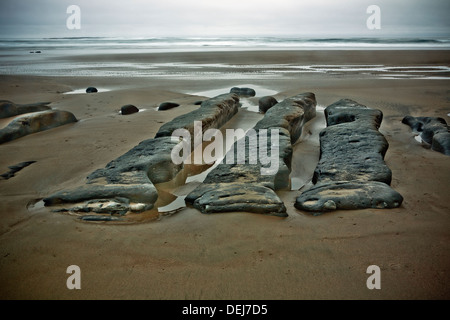 OREGON - arenaria erosa sul Beverly Beach Beverly Beach State Park vicino a Newport sulla costa dell'Oregon. Foto Stock