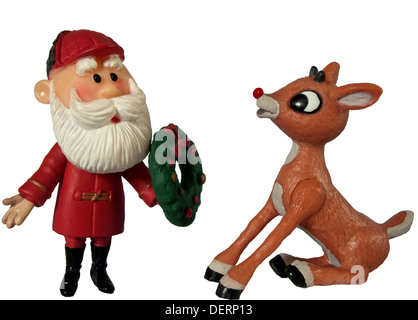 Le figure dei personaggi di Babbo Natale e Rudolph il naso rosso renne su sfondo bianco Foto Stock