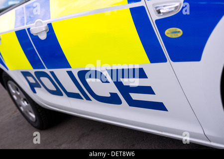 I dettagli sul lato di un'auto della polizia britannica Foto Stock