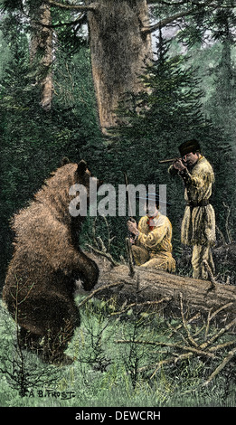 Cacciatori di frontiera la ripresa di un orso. Colorate a mano la xilografia di A.B. Illustrazione di brina Foto Stock