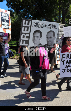 London, Ontario, Canada . 24Sep, 2013. Una protesta per chiedere al governo egiziano di release 2 cittadini canadesi in detenzione. Il 16 agosto pronto soccorso medico Loubani Tarek e regista John Grayson sono stati arrestati al Cairo mentre viaggia attraverso l'Egitto per la Striscia di Gaza, nessun motivo è stato dato per la loro detenzione. Credito: Jonny bianco/Alamy Live News Foto Stock