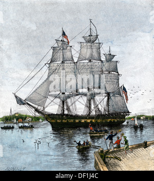 USS "Costituzione" trainato fuori del porto di Boston, 1812. Colorate a mano la xilografia Foto Stock