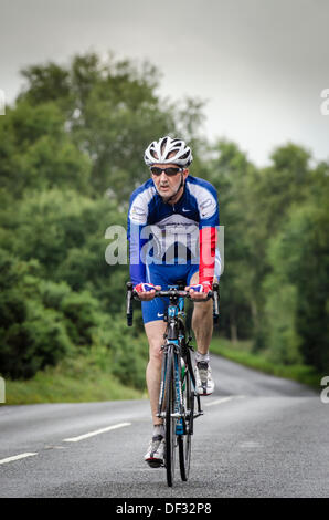 Brian Cookson presidente del UCI, Union Cycliste Internationale, equitazione il British 2012 Maestri nazionali di corsa su strada campionato. Foto Stock