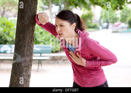 ANGINA PECTORIS DONNA Foto Stock