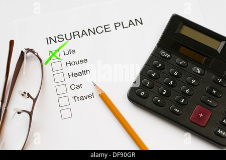 Piano assicurativo spessa schema casella con una crocetta sulla vita Foto Stock