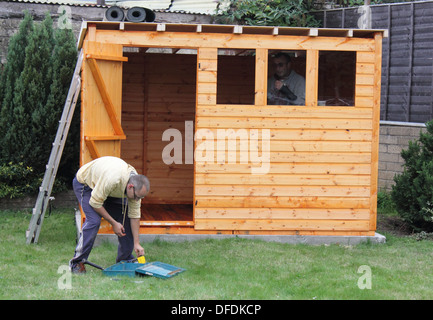 La costruzione di una tettoia in legno Foto Stock