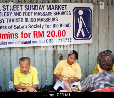 Piede cieco massaggiatori, Sabah, Malaysia Foto Stock