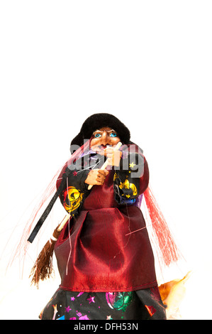 Strega su uno sfondo di legno Foto Stock