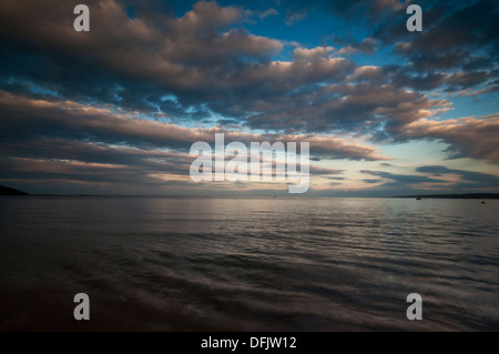 Tramonto sulla baia a Filey sulla East Yorkshire costa. Foto Stock