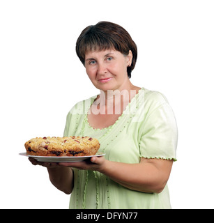 Ritratto di una donna di mezza età tenendo un home-cotta Foto Stock