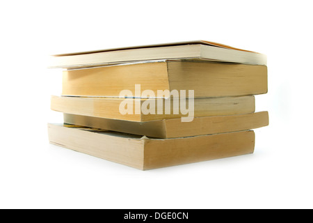 Pila di libri vecchi isolati su sfondo bianco Foto Stock