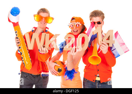 Due ragazzi e una ragazza, i tifosi del calcio olandese team. Foto Stock