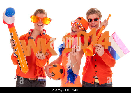 Due ragazzi e una ragazza, i tifosi del calcio olandese team. Foto Stock