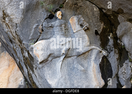 Bassorilievo in pietra, macedone horse rider sulla tomba di Alcetas, antica città di Termessos, sui monti Taurus, Termessos Foto Stock