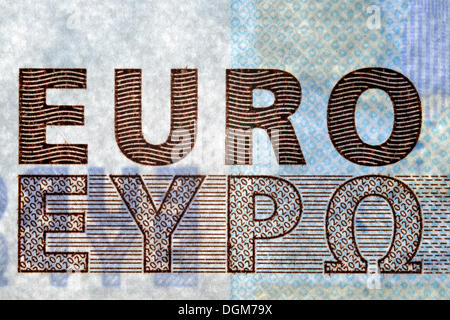Le caratteristiche di sicurezza delle banconote, 20 euro bill, stampa in rilievo, numeri di valore nella finestra, scritte EURO Foto Stock