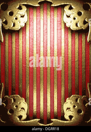 Oro su sfondo rosso Foto Stock
