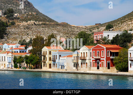 Case nella baia, Megisti città sull isola di Kastellorizo, Meis, isole Dodecanesi, Egeo, Mediterraneo, Grecia, Europa Foto Stock