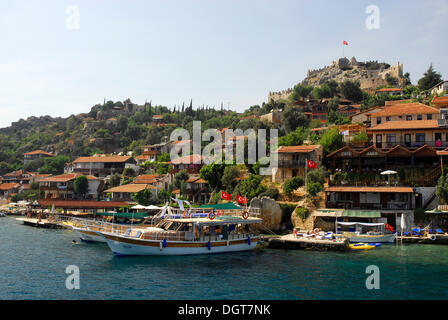 Il villaggio di Kale, Kalekoey o Simena, Baia di Kekova, Lycian coast, Provincia di Antalya, Mediterraneo, Turchia, Eurasia Foto Stock