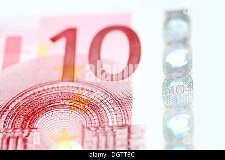 Dieci di banconote in euro in stretta fino Foto Stock