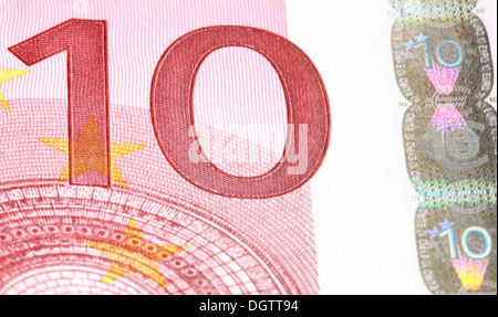 Dieci di banconote in euro in stretta fino Foto Stock