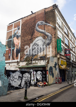Arte di strada da Roa e Martin Ron off Brick Lane, a est di Londra. Foto Stock