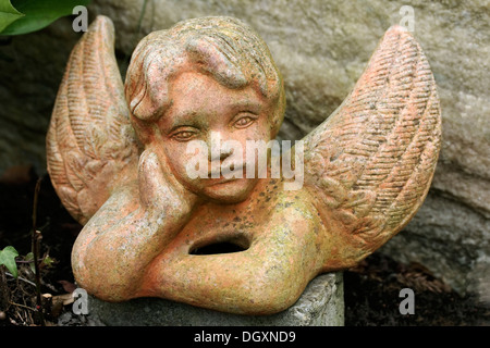 Angelo scolpito in pietra, muratura di pietra Foto Stock