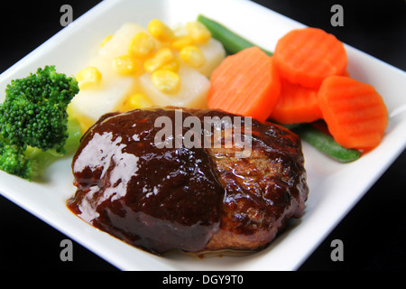 Piastra di hamburger steak Foto Stock