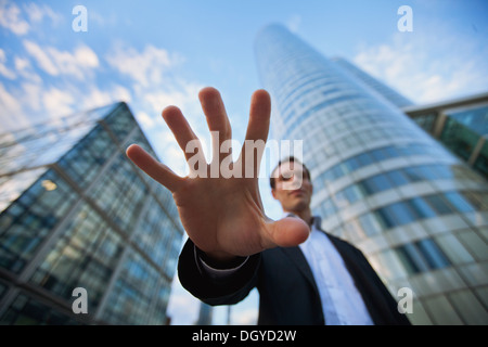 Minaccia in business, per rubare denaro Foto Stock