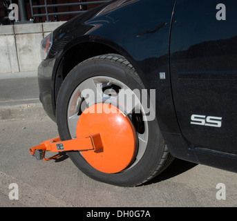 Avvio della ruota, traffico violazione Foto Stock