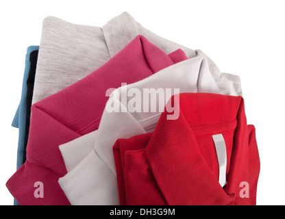 Pila di uomo e di una donna polo t shirt Foto Stock