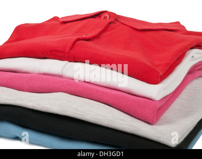 Pila di uomo e di una donna polo t shirt Foto Stock