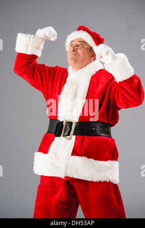 Il tifo di Babbo Natale Foto Stock