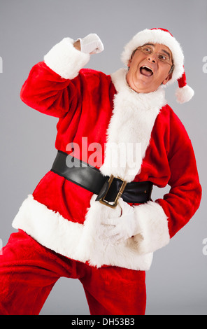 Il tifo di Babbo Natale Foto Stock