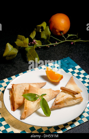 Fetta sottile con angoli di crema Foto Stock