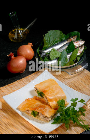 Gnocchi con le sardine, le empanadas de sardinas Foto Stock