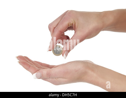 Mano dando un Euro Foto Stock