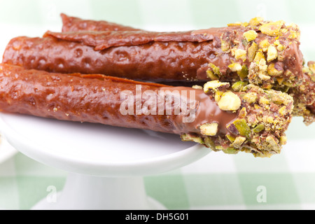 Tre brandy scatta con pistacchi Foto Stock