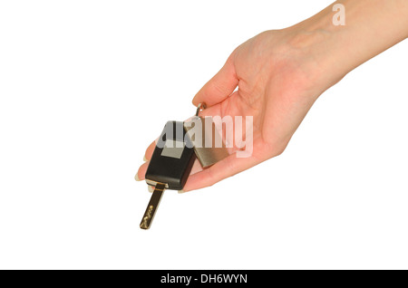 Donna elegante la mano con le nuove chiavi della macchina e portachiavi isolato su bianco Foto Stock