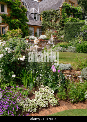 Giardino e Manor House, Coton Manor, Coton, Northamptonshire, Regno Unito Foto Stock