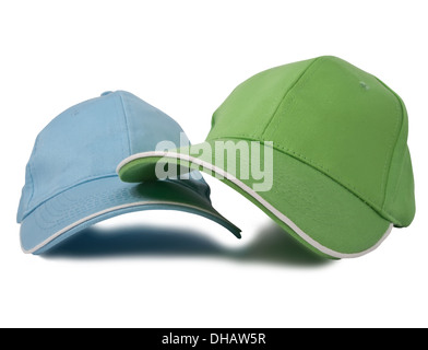 Due i cappelli da baseball isolati su sfondo bianco Foto Stock