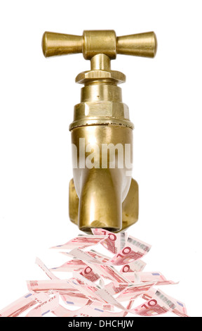 Golden vintage toccare con il denaro che fluisce fuori Foto Stock