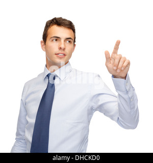 Imprenditore lavora con immaginario schermo virtuale Foto Stock
