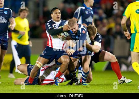 Salford, Regno Unito. 07 Nov, 2013. Tui Samoa (USA Redcliffe delfini) durante la Coppa del Mondo di Rugby group C/D gioco tra Scozia e Stati Uniti d'America dall'AJ Bell Stadium. Credito: Azione Sport Plus/Alamy Live News Foto Stock