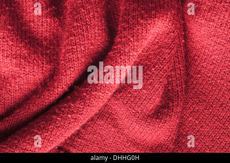 Close up di rosso a maglia tessuto di lana come sfondo Foto Stock