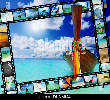 Longtail boat sul mare spiaggia tropicale Foto Stock