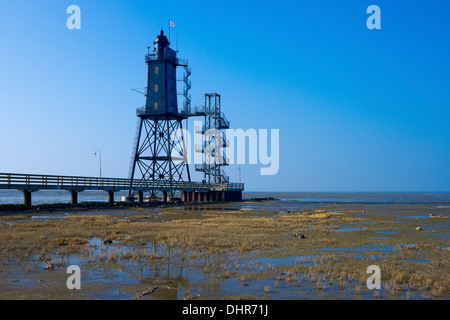 Obereversand faro del porto di Dorum / Neufeld a bassa marea, Bassa Sassonia, Germania Foto Stock