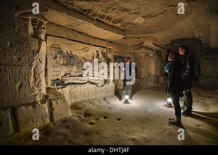 Paesi Bassi, Maastricht, disegno a carboncino in grotte di Sint Pietersberg. Tour guidato Foto Stock