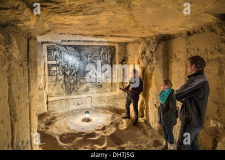 Paesi Bassi, Maastricht, disegno a carboncino in grotte di Sint Pietersberg. Tour guidato Foto Stock